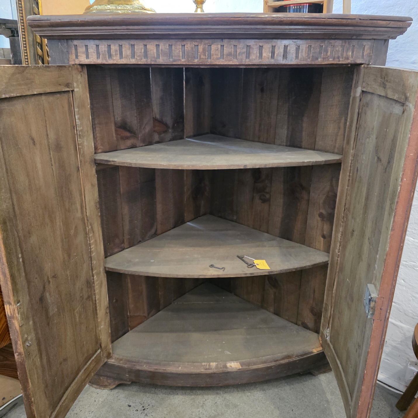 A French Louis XVI Corner Cabinet A French Louis XVI Corner Cabinet